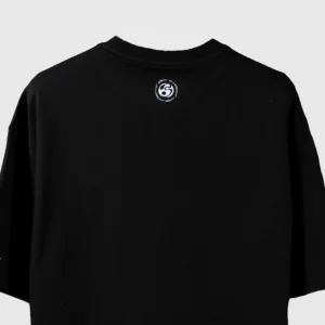 Back view of black oversized t-shirt with small circular Blumun logo printed below the collar – minimalist streetwear branding