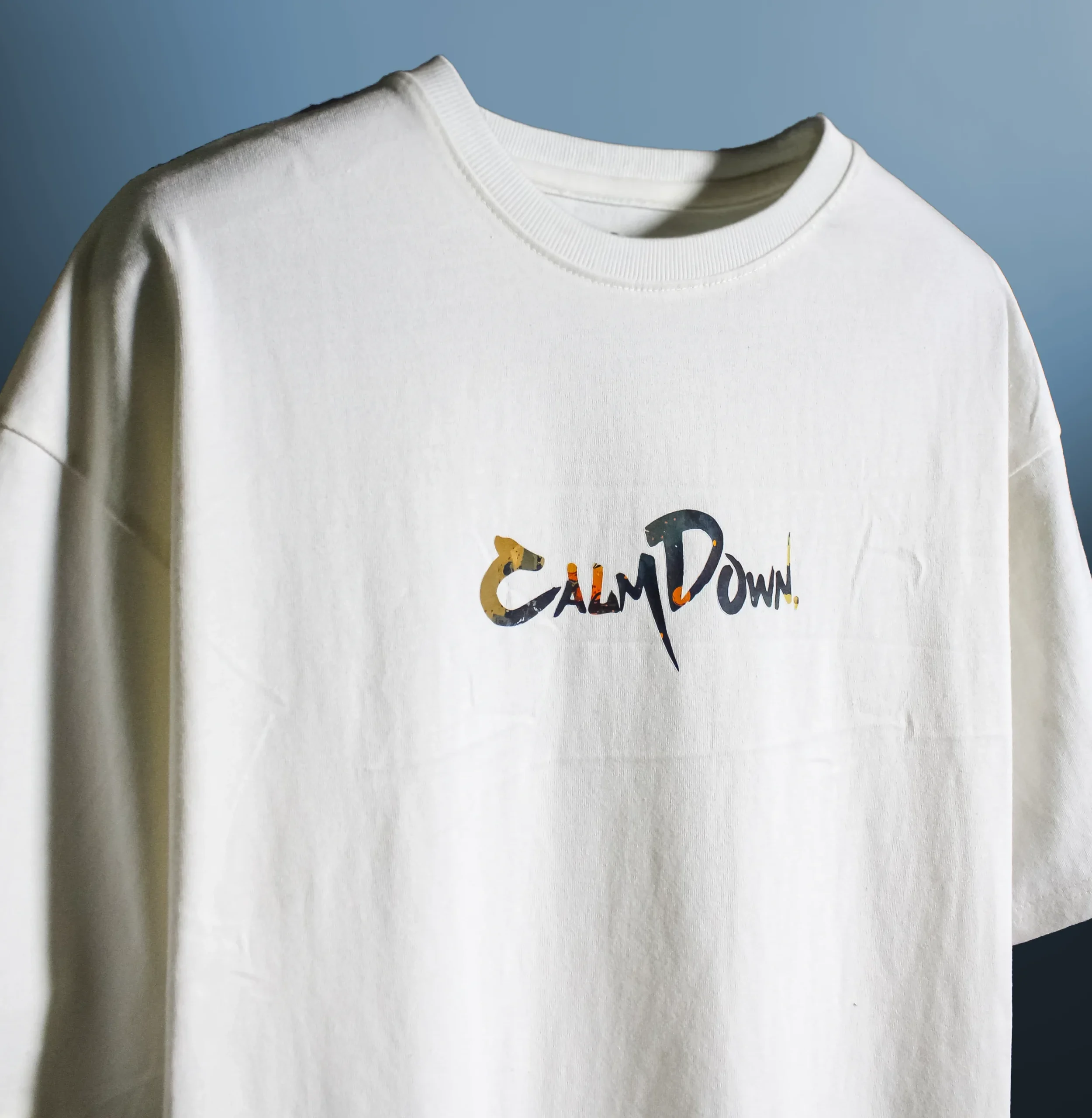 Calm Down Nobody Cares T‑Shirt front graphic close-up