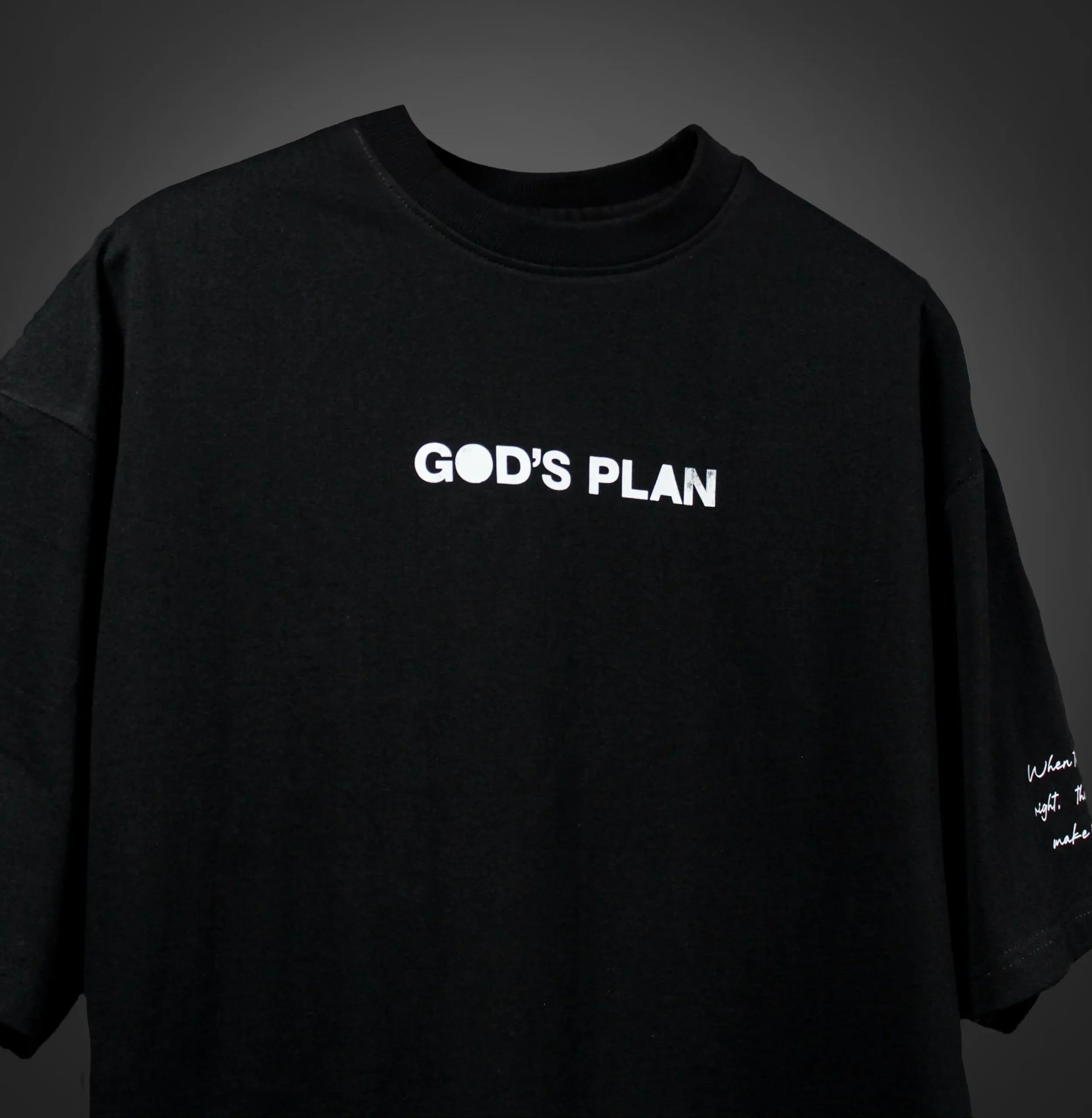 Front view of the GOD'S PLAN t-shirt with clean typography centered on the chest. Premium streetwear t-shirt | oversized t-shirt by BLUMUN